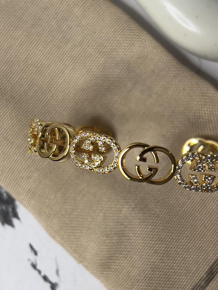 اسوارة + خاتم GUCCI ذهبي