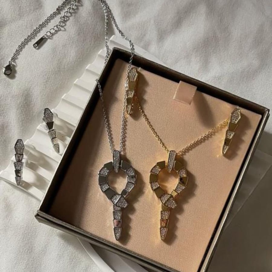 سلسال BVLGARI ذهبي - فضي