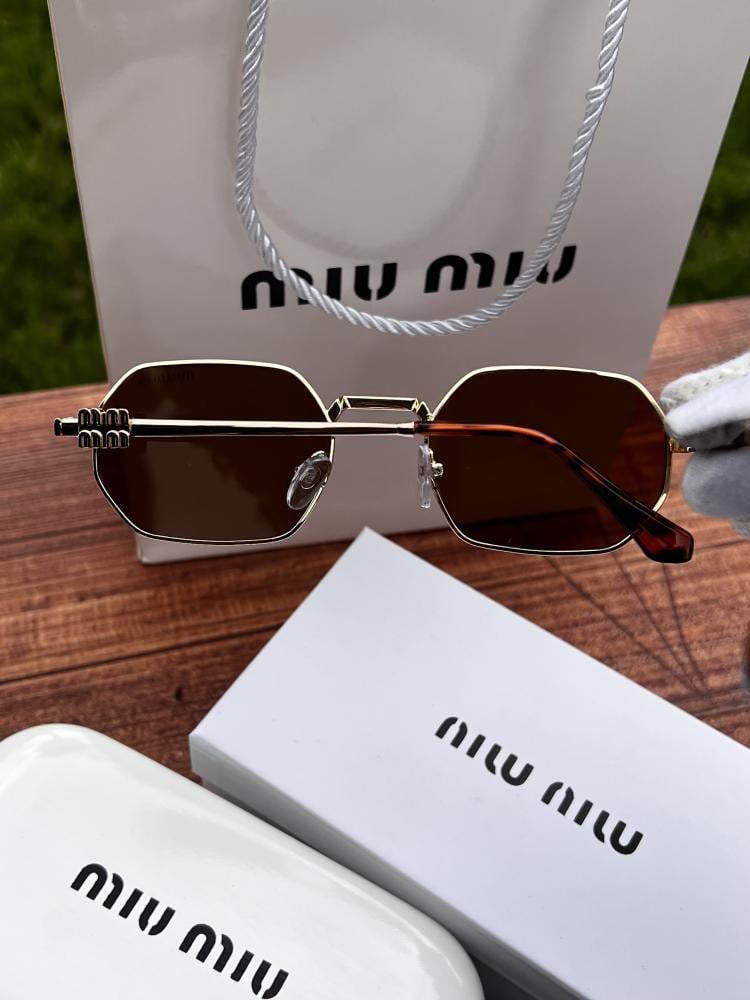 نظارة miu miu أطار ذهبي طرف تايقر - عدسة بني