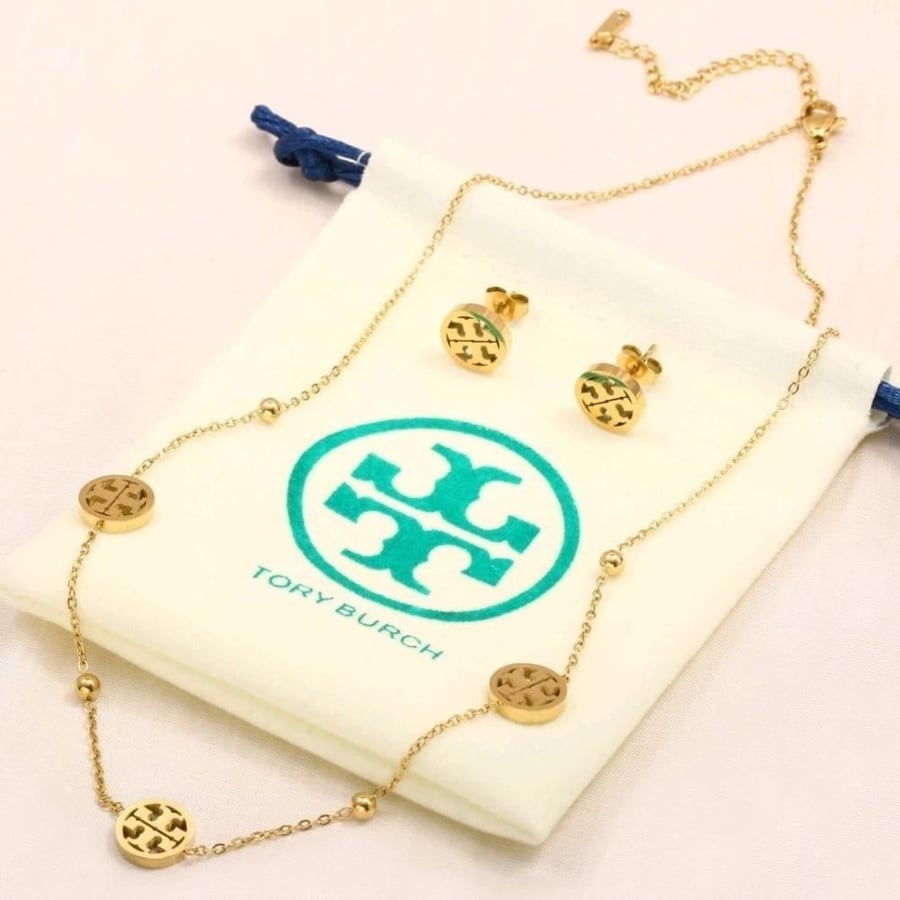 سلسال TORY BURCH سلسال مع حلق TORY BURCH معدن ذهبي بفصوص كرستال زركون