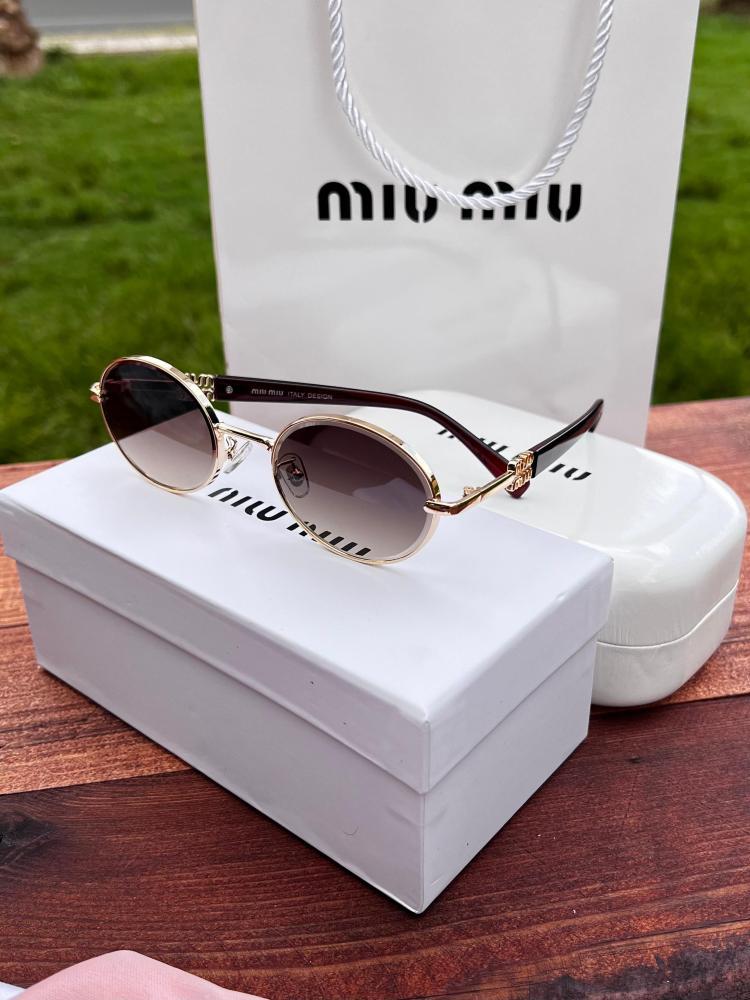 نظارة miu miu أطار بني غامق - عدسة بني مدرج