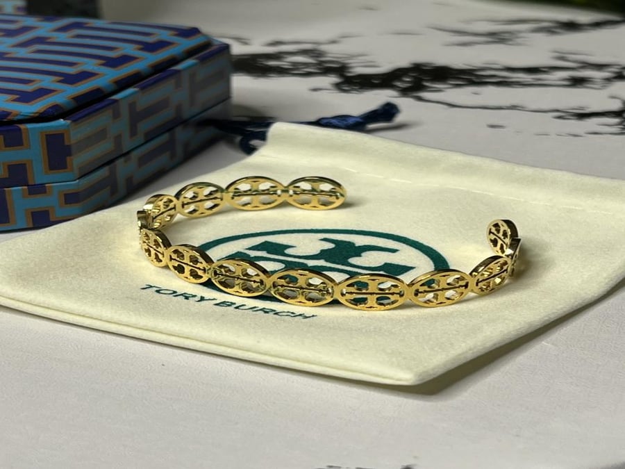 إسوارة TORY BURCH معدن ذهبي بفصوص