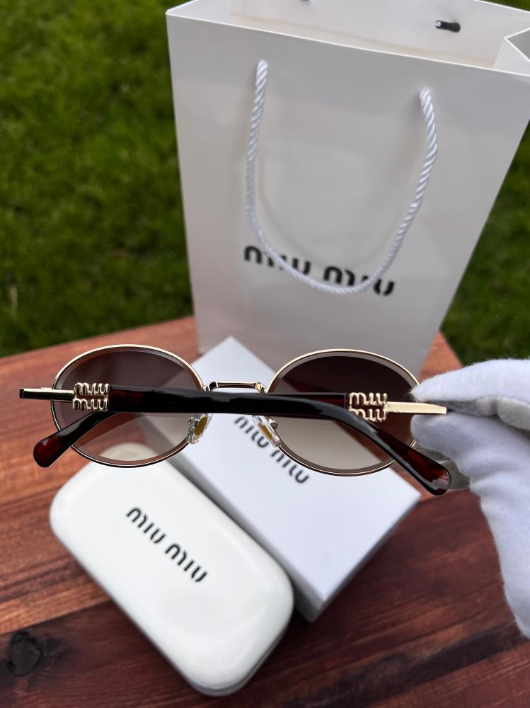 نظارة MIU MIU نظارة miu miu أطار بني غامق عدسة بني مدرج