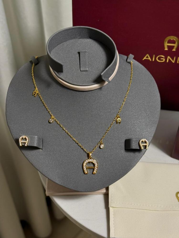 سلسال AIGNER سلسال مع حلق AIGNER معدن ذهبي