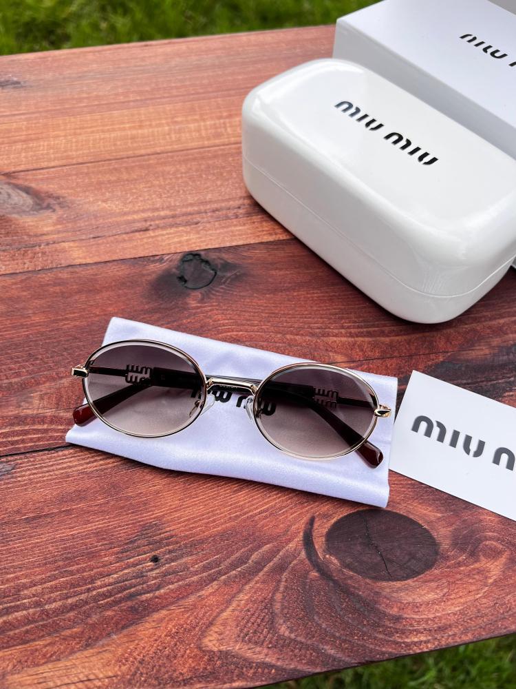 نظارة miu miu أطار بني غامق - عدسة بني مدرج