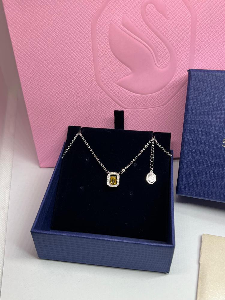 سلسال SWAROVSKI - سلسال سوارفيسكي فضي بكرستالة صفراء