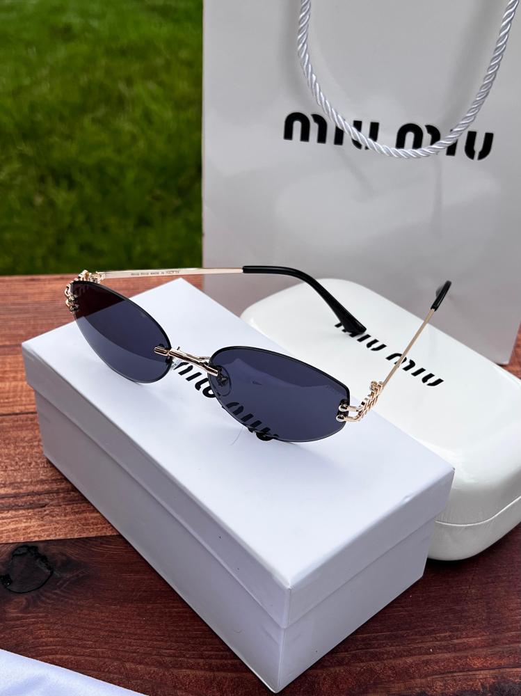 نظارة MIU MIU نظارة miu miu أطار ذهبي عدسة اسود
