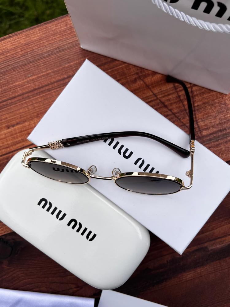 نظارة miu miu أطار بني غامق - عدسة بني مدرج