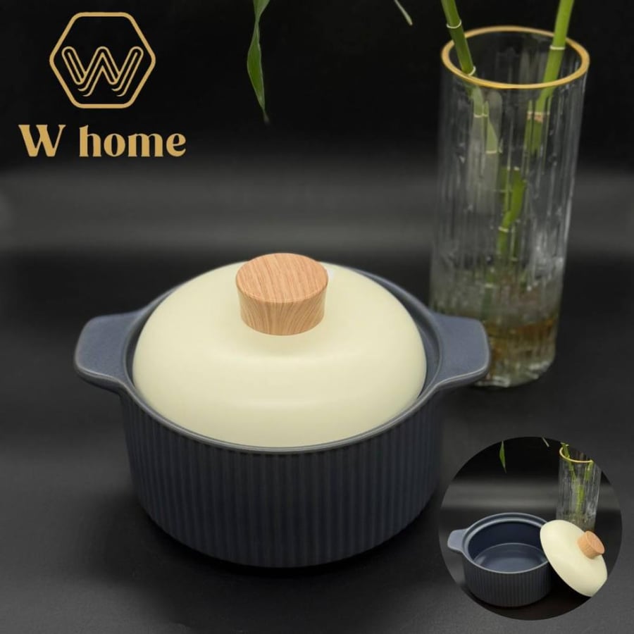 Black ceramic pot with white lid