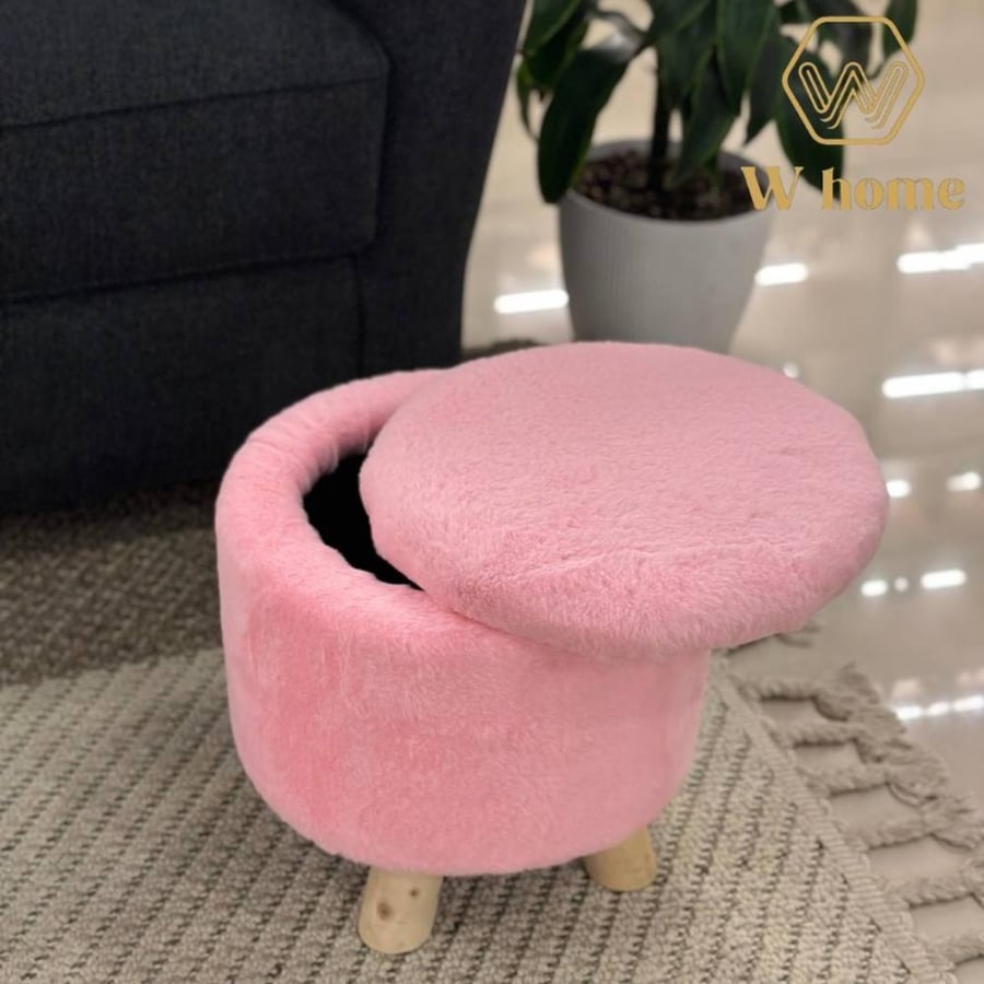 A small seat with wooden legs