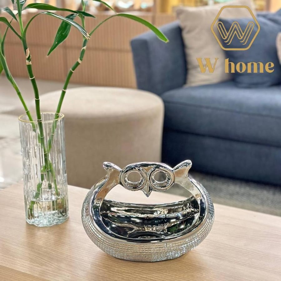 A silver masterpiece with a holder