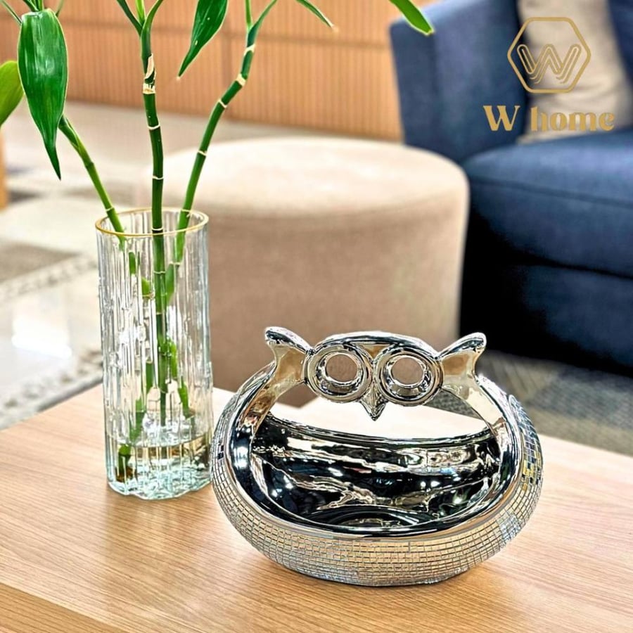 A silver masterpiece with a holder