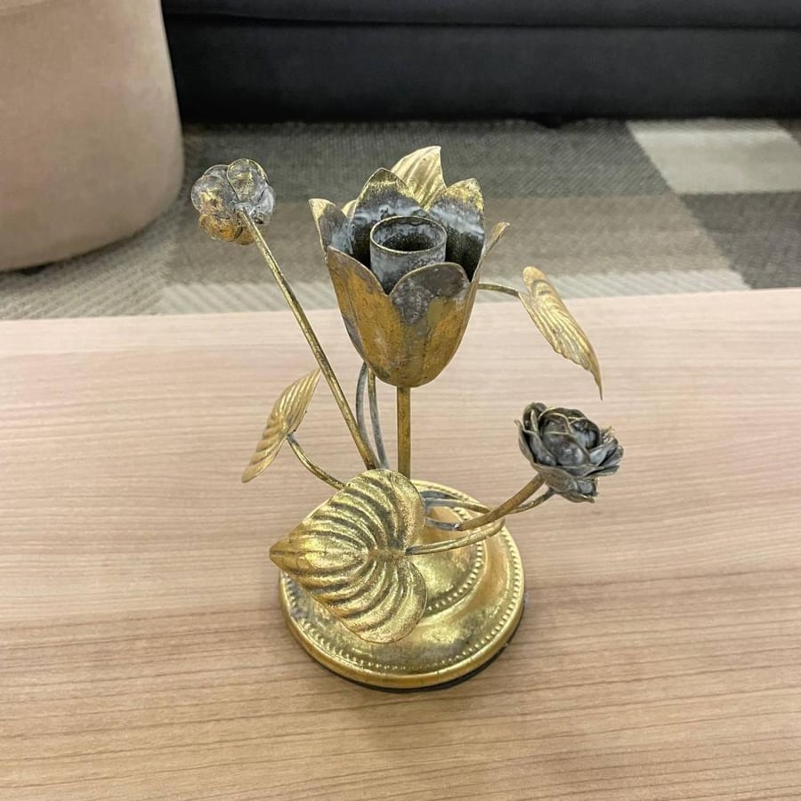 Small golden candle holder