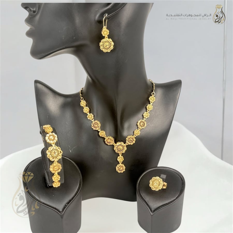 طقم بديل الذهب زهور