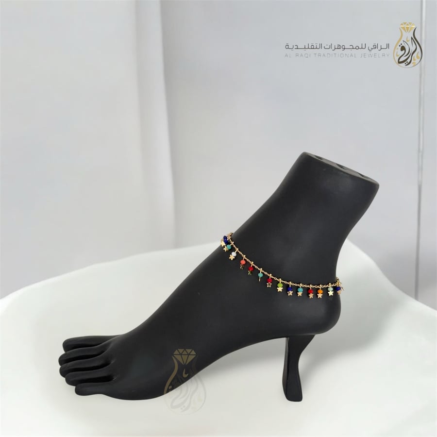 خلخال ذهبي بكرات ملونة