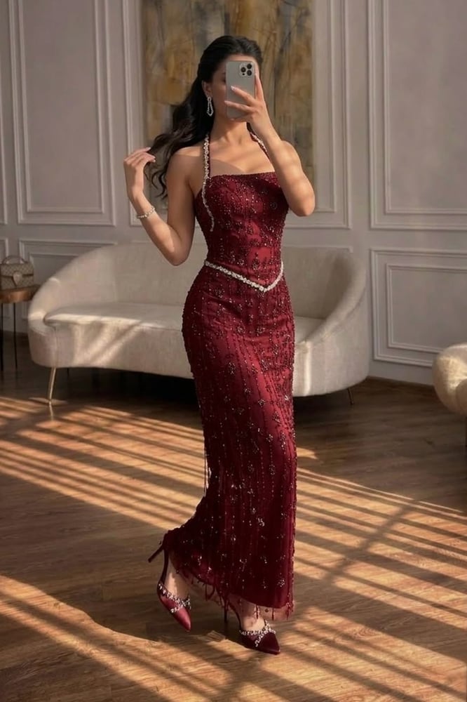 Queen's evening dress embroidered with crystal beads
