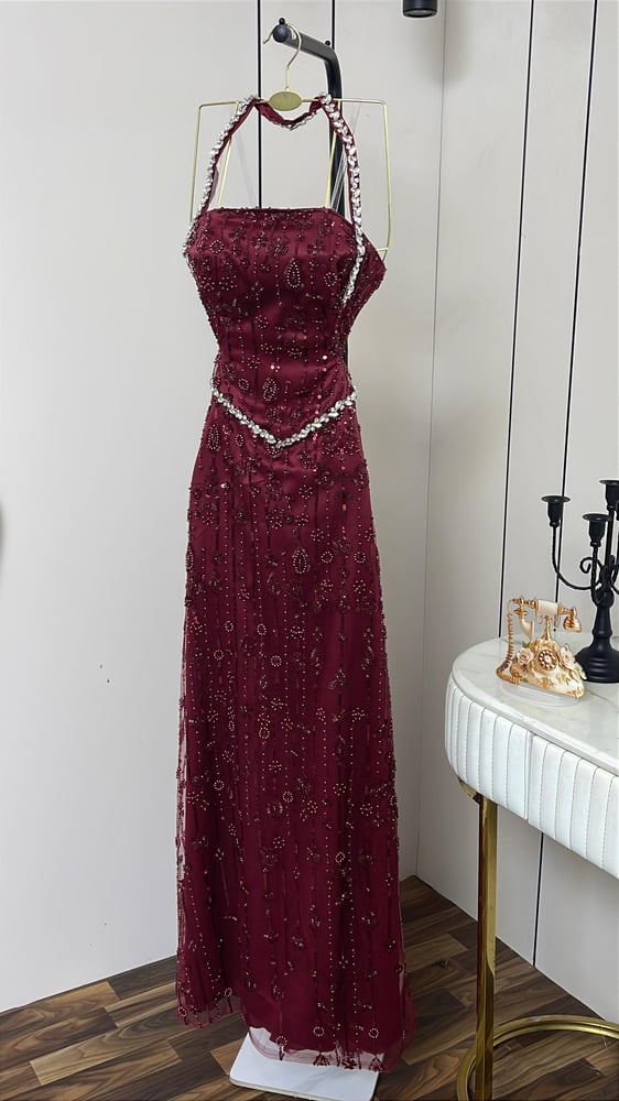Queen's evening dress embroidered with crystal beads