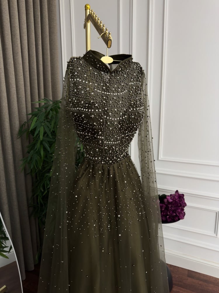 The enchanting "Emerald Night" dress - the luxury of tulle and pearls