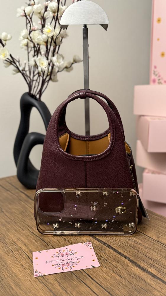 Lana mini coach bag in orange