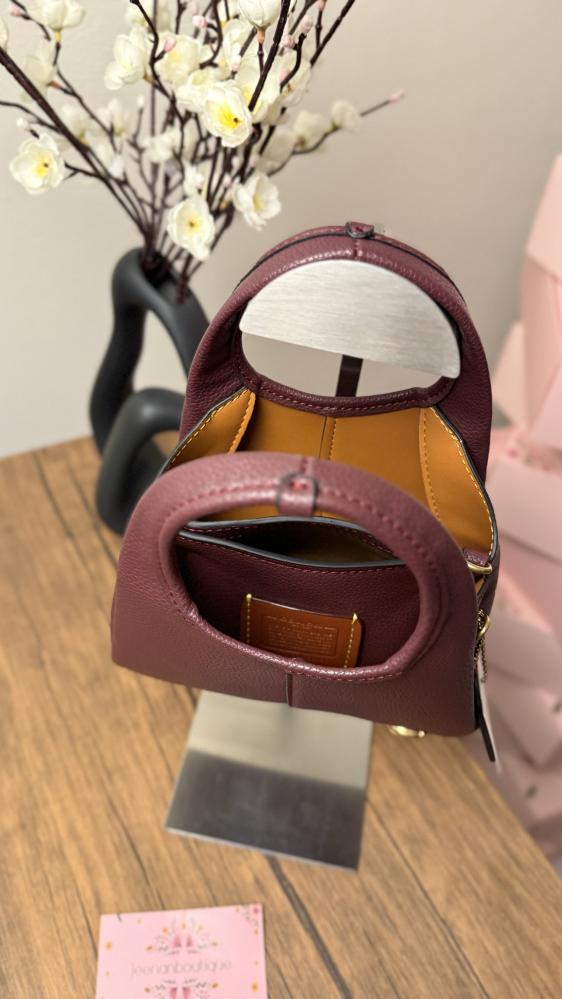 Lana mini coach bag in orange