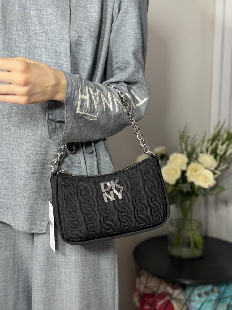شنطة دكني لورينا هوبو سمول بوليستر سجنشر DKNY LORENA SHOULDER BAG