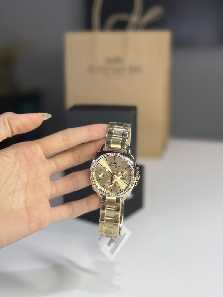 كوتش بويفرند قولد واتش ذهبي coach boyfriend gold watch