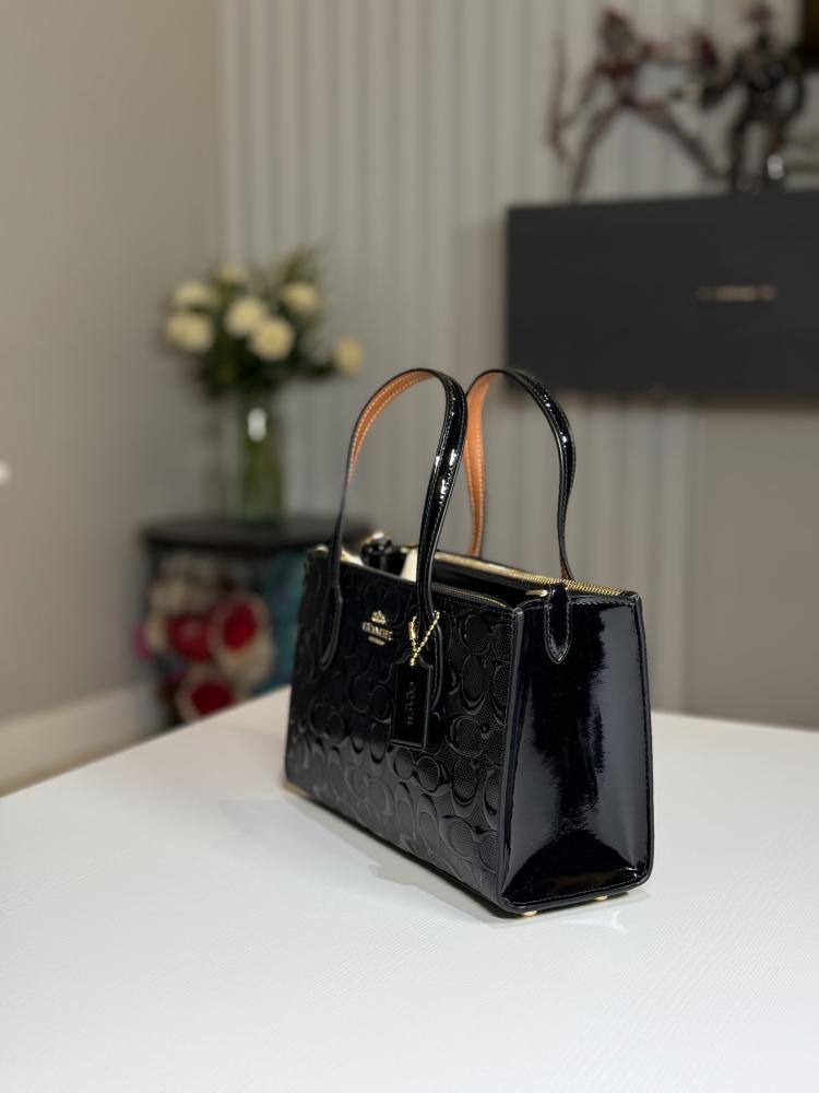 شنطة كوتش توت صغيره نينا سجنشر بلون اسود اامبوزد Nina Small Tote Bag In Signature Leather Black