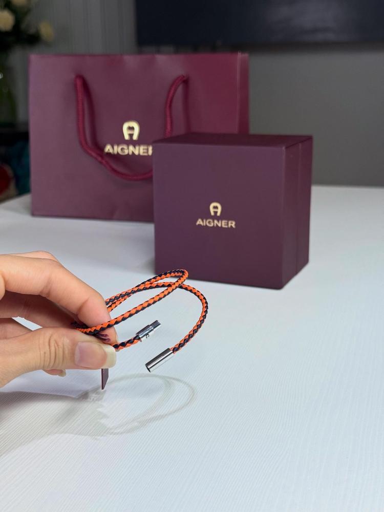 اسوار اجنر رجالي مجدل نحيف لفتين بلون برتقالي واسود Aigner Men Bracelet 18cm orange and black
