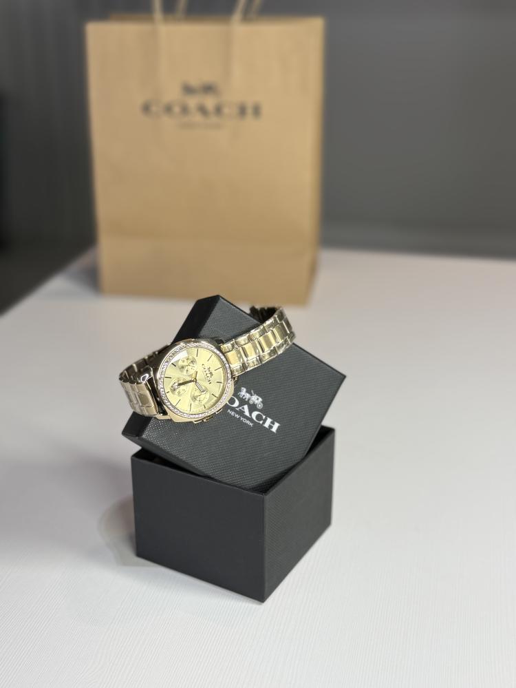 كوتش بويفرند قولد واتش ذهبي coach boyfriend gold watch