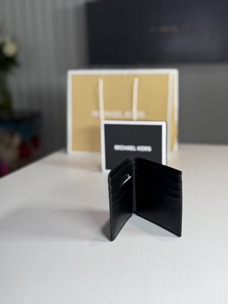 محفظة مايكل كورس سليم بيلفولد سجنشر اسود micheal kors SLIM BILLFOLD black signature