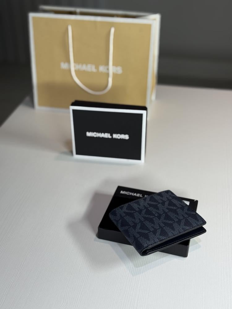 محفظة مايكل كورس سليم بيلفولد سجنشر كحلي micheal kors SLIM BILLFOLD navy signature