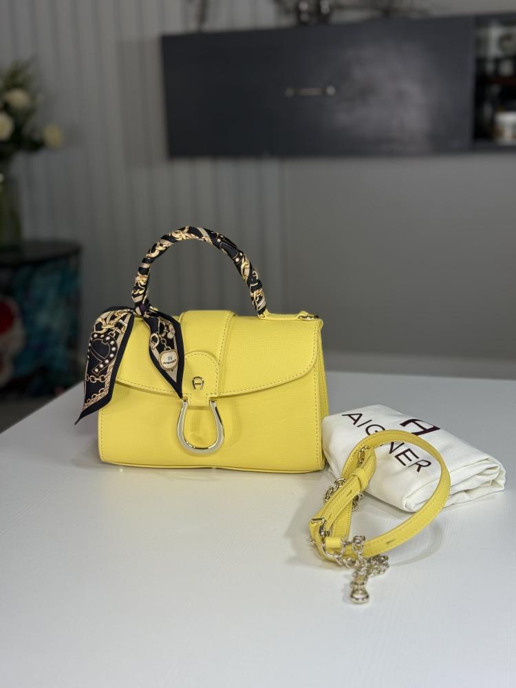 شنطة اجنر افيفا توب هاندل سمول بلون اصفر باستيل وسكارف فخم EVVIVA HANDBAG S