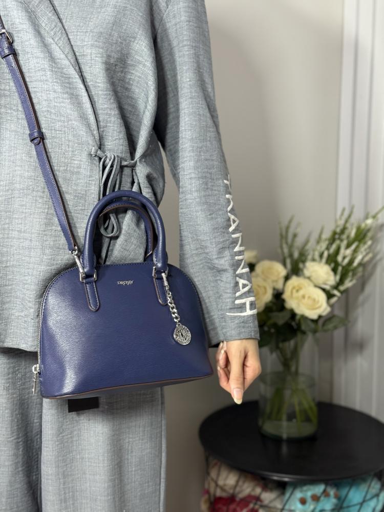 شنطة دكني دوم براينت باللون الازرق مع شارم DKNY Bryant Dome Satchel Bagblue