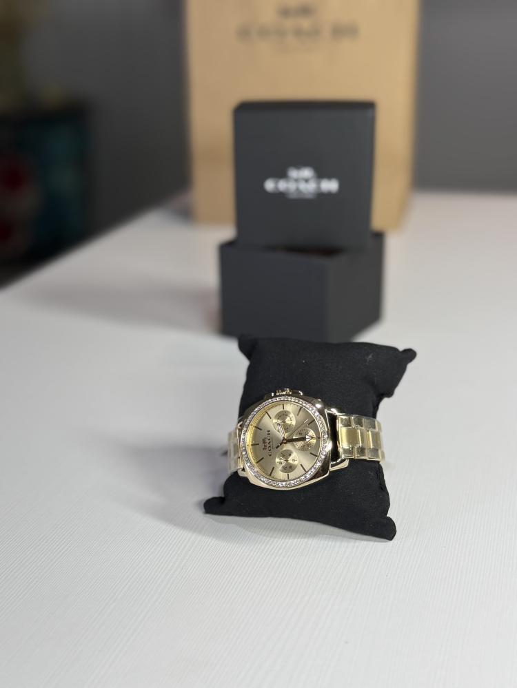 كوتش بويفرند قولد واتش ذهبي coach boyfriend gold watch