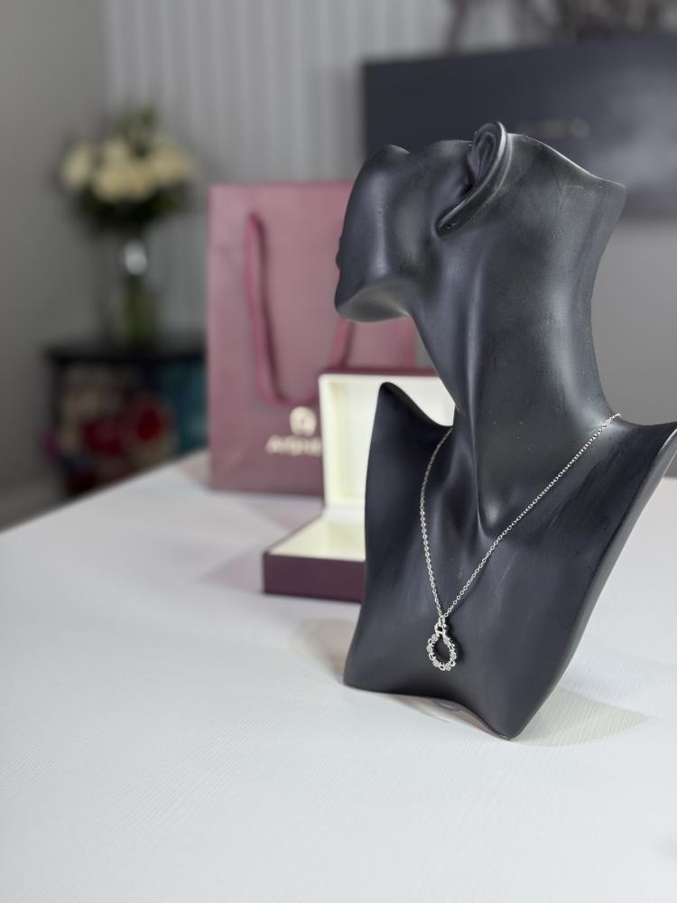 سلسلة اجنر باللون الفضي مرصعة باحجار سوارفسكي Aigner silver necklace with Swarovski crystal's