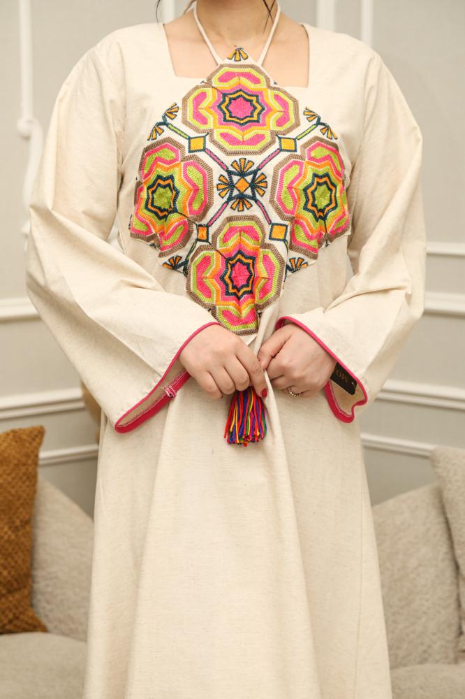 Beige thobe with luxurious embroidery on the chest