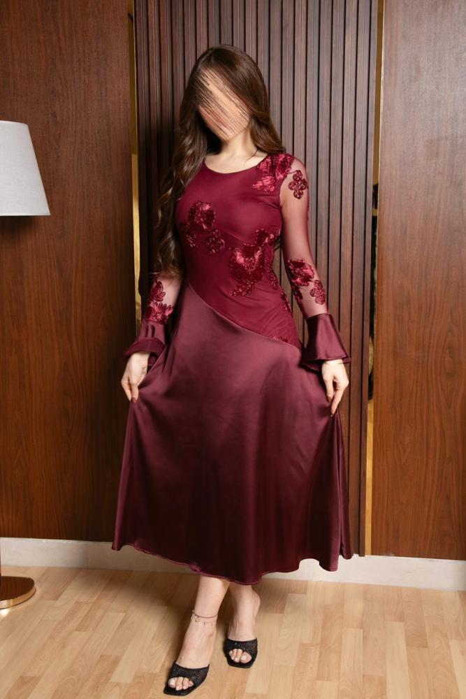 Elegant dress decorated with embroidery from the top and satin from the bottom
