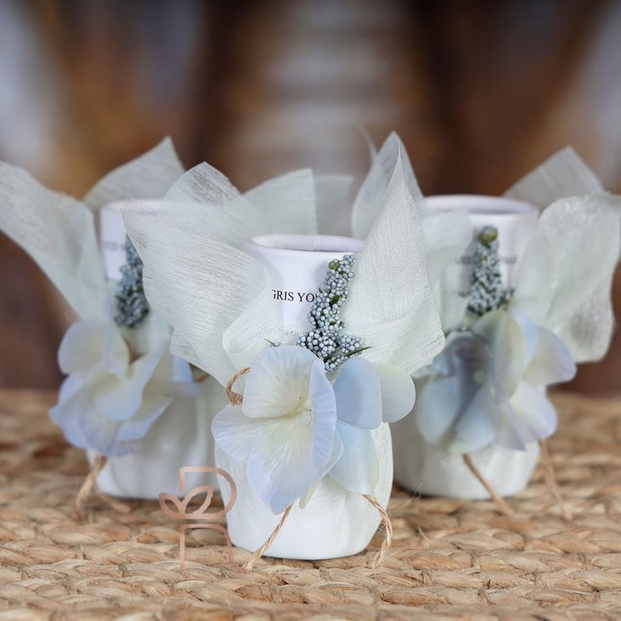 Perfume with pistachio and sky-colored packaging
