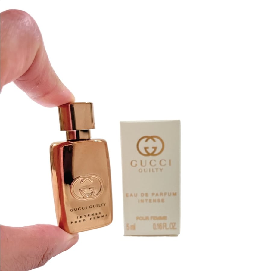 عطر مني اصلي من قوتشي