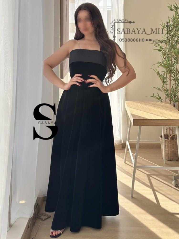 فستان سواريه أسود طويل - سحر الأناقة الكلاسيكية