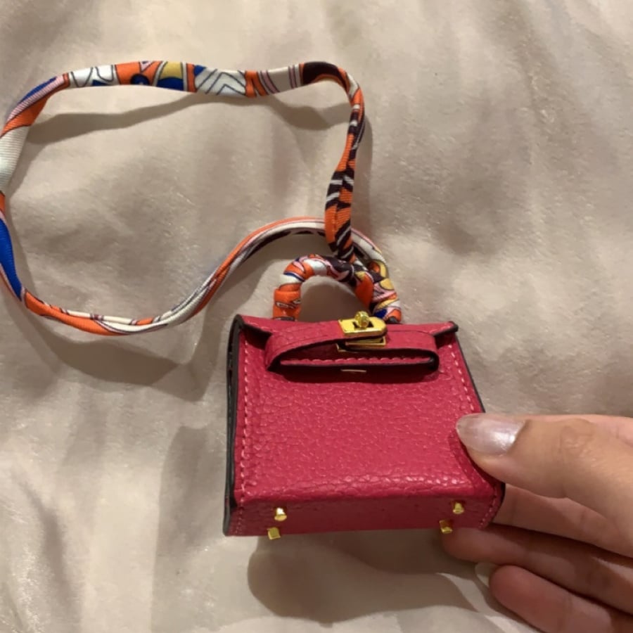 ميدالة - Hot pink kelly bag