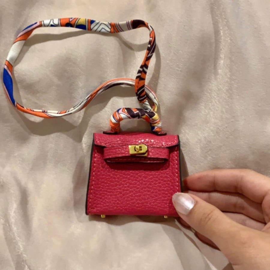 ميدالة - Hot pink kelly bag