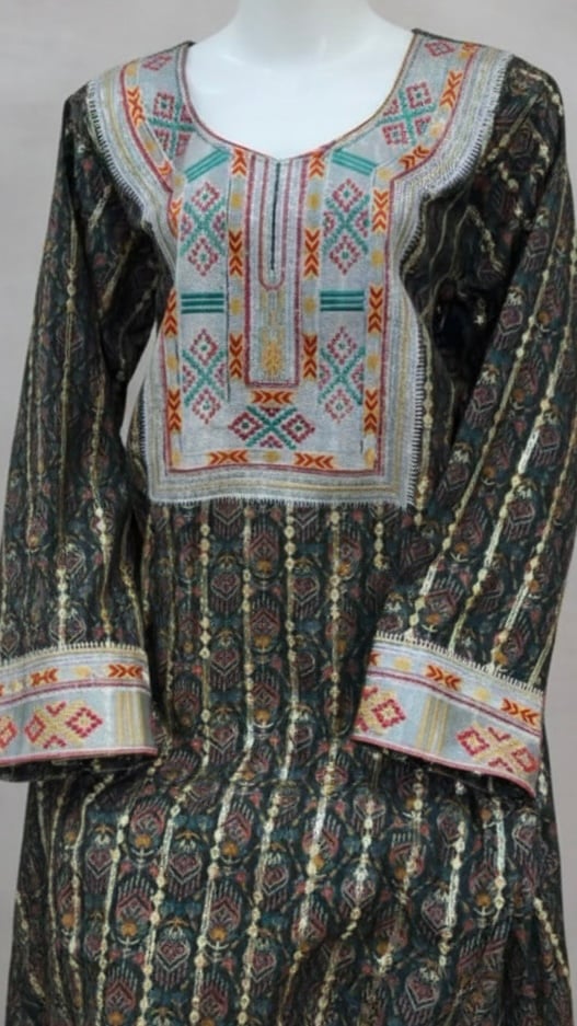 The piece of fabric with traditional geometric patterns