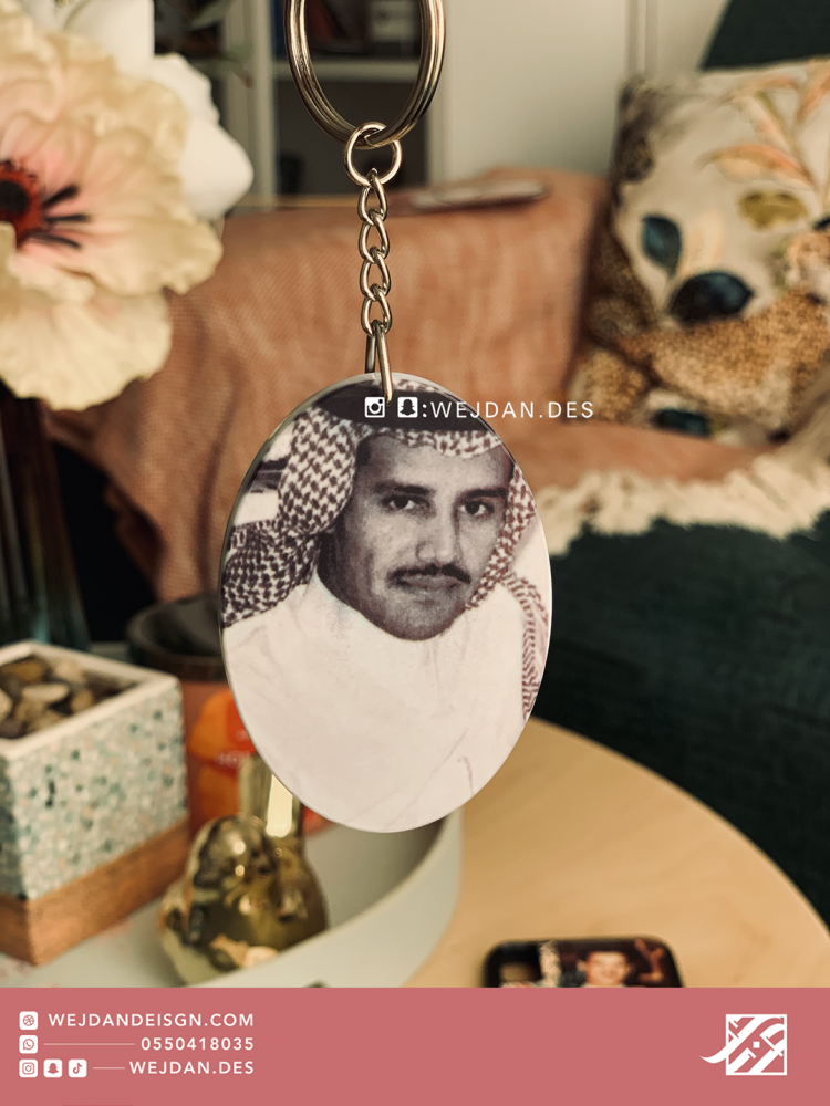 Medal: a picture of Khaled Abdulrahman in black and white.