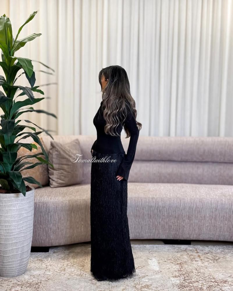 Black jersey dress with a draped scarf