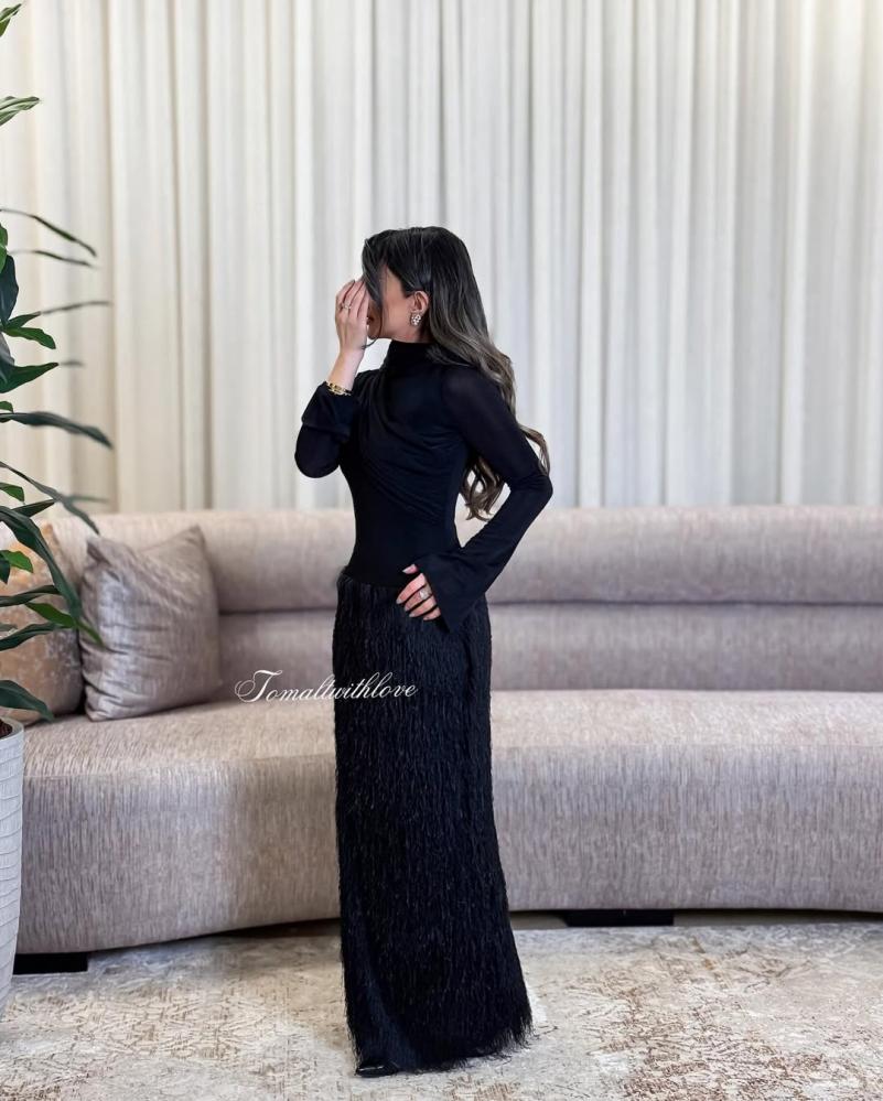 Black jersey dress with a draped scarf
