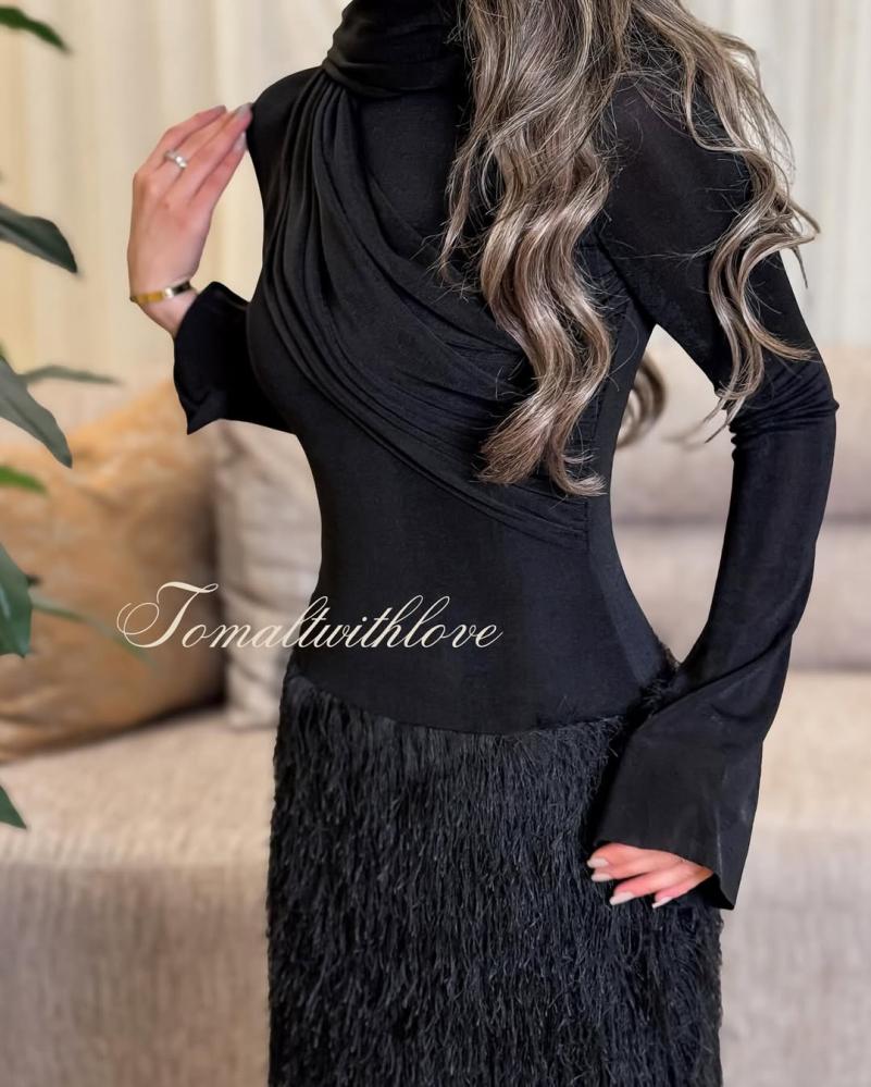 Black jersey dress with a draped scarf