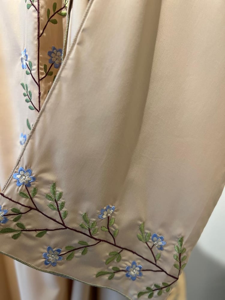 A prayer dress embroidered