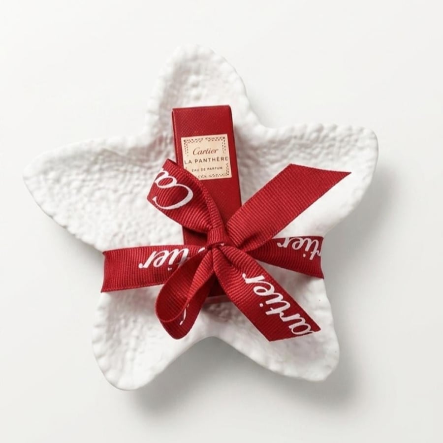 5 Cartier distributions: Cartier perfume ampoules with a star-shaped base for rings and bracelets