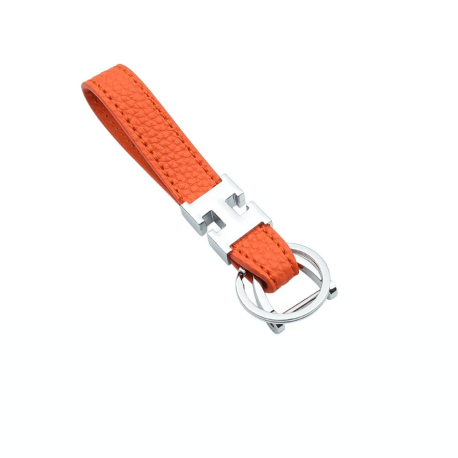 H leather medal with Hermes design in Hermes box with Hermes strap